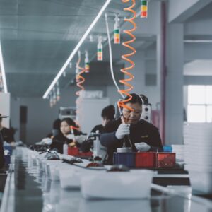 a group of people working in a factory